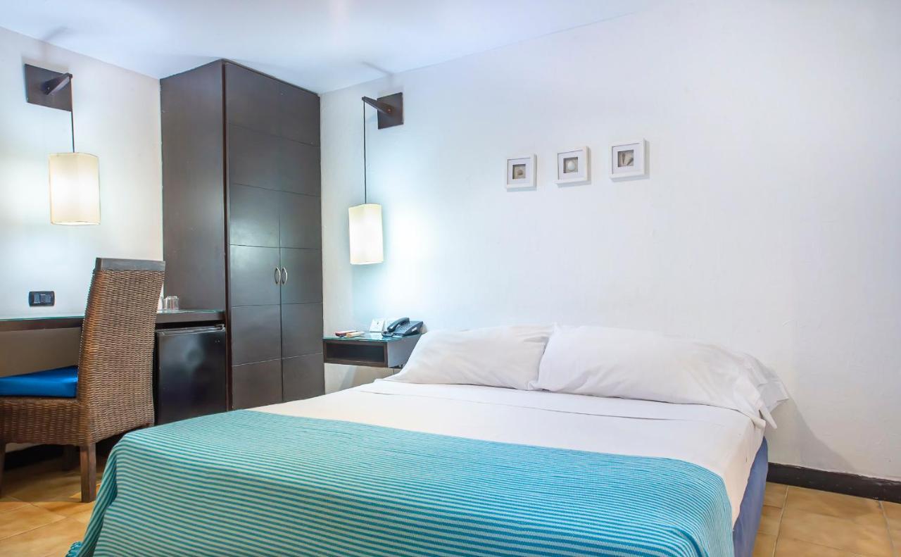 Hotel Santorini Express Y Cabanas Σάντα Μάρτα Εξωτερικό φωτογραφία