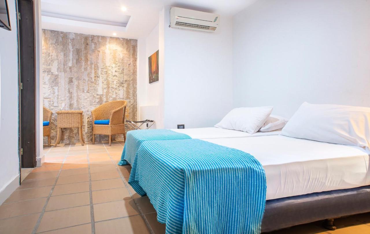 Hotel Santorini Express Y Cabanas Σάντα Μάρτα Εξωτερικό φωτογραφία